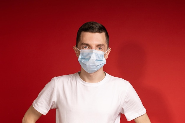 Man in white Tshirt and protective mask close up shot