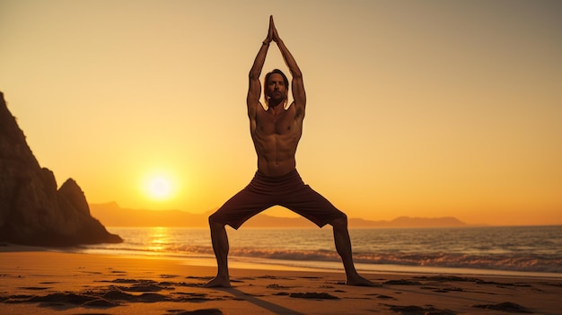 A man with a bare torso practices yoga in a warrior pose on a sea beach at sunset