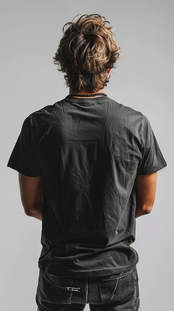 a man with a black shirt that has a back that says quot no quot on it