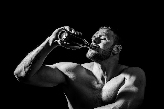 Man with bottle of beer close up face Drunk man drinker alcoholic with alcoholism problem alcohol ab