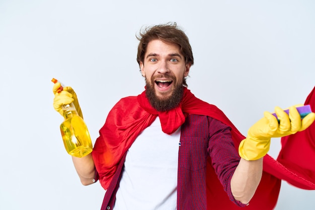 Man with cleaning supplies professional housework lifestyle