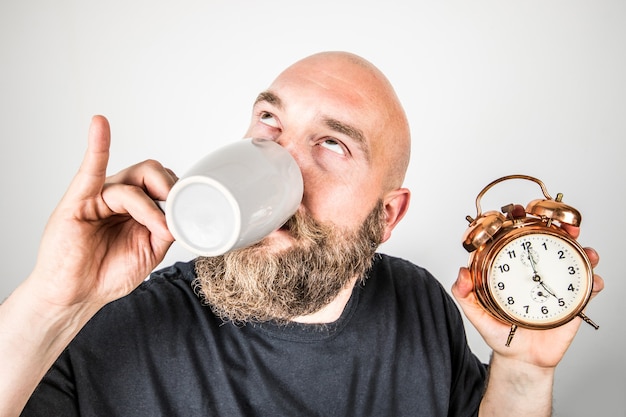 Man with a cup for the tea time