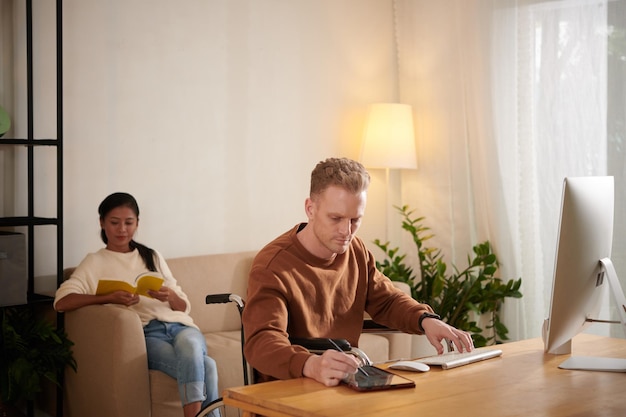 Man with Disability Working from Home