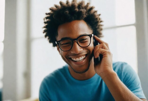 a man with dreadlocks is smiling and wearing glasses