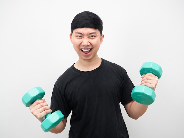 Man with dumbbell feeling joyful with exercise