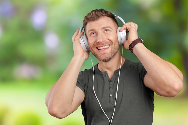 Man with earphones listening to music