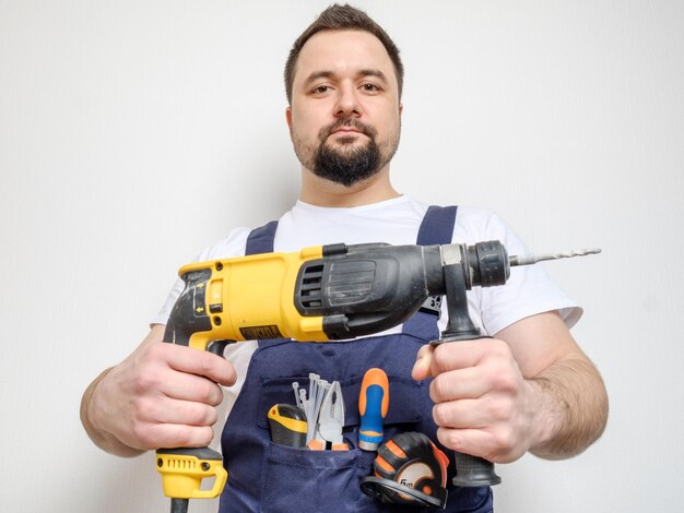 Man with electric drill