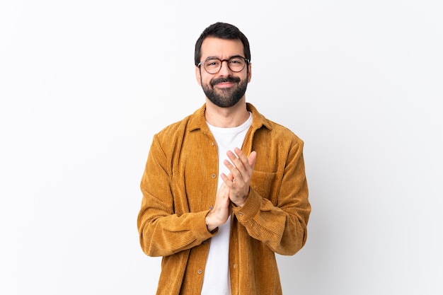 Man with glasses and yellow shirt