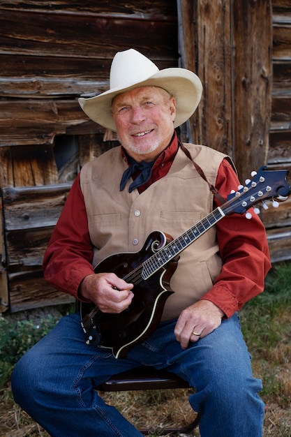 Man with guitar getting ready for country music concert