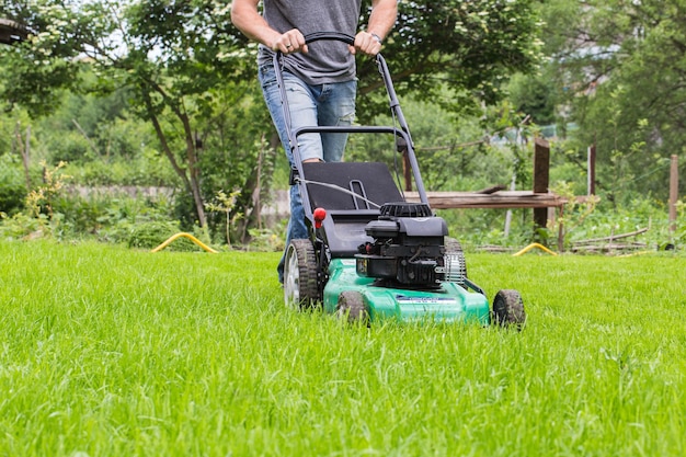 Man with lawn mower