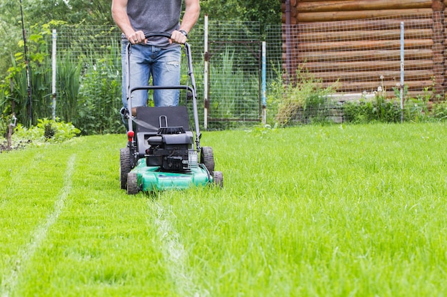 Man with lawn mower