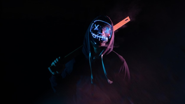 Man with lights purge mask with black background