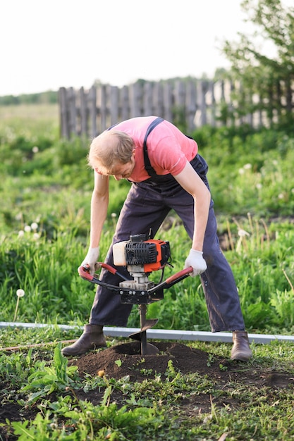 Man with shovel digging the ground