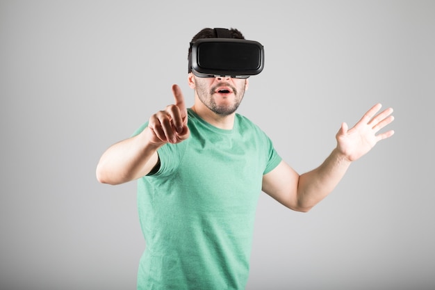 Man with virtual reality glasses isolated