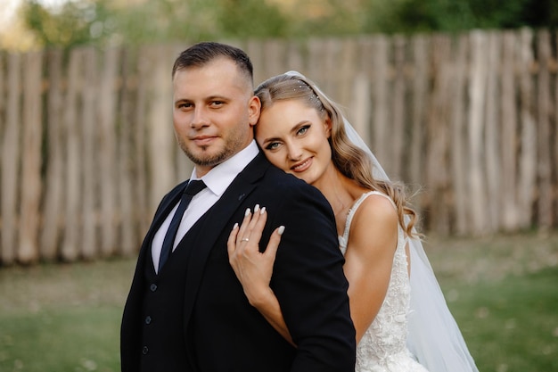 a man and woman are posing for a photo