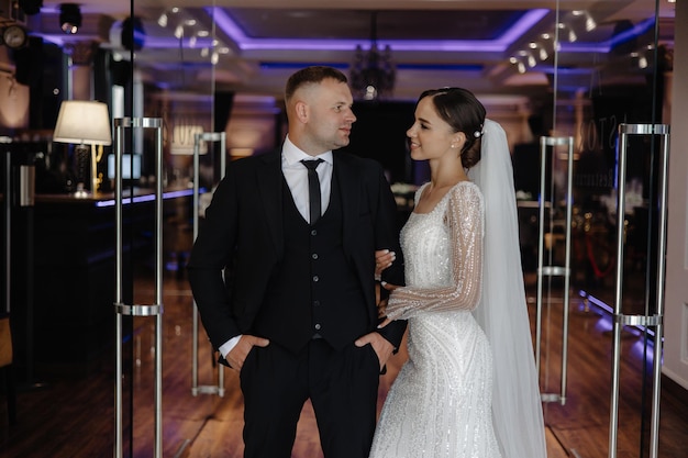 a man and a woman are standing in a doorway