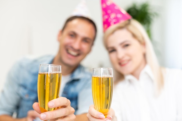 man and woman are wearing holidays caps