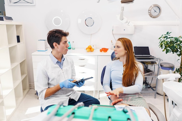 Man and woman in modern dentist office