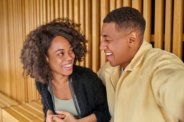 Man and woman sitting looking at each other