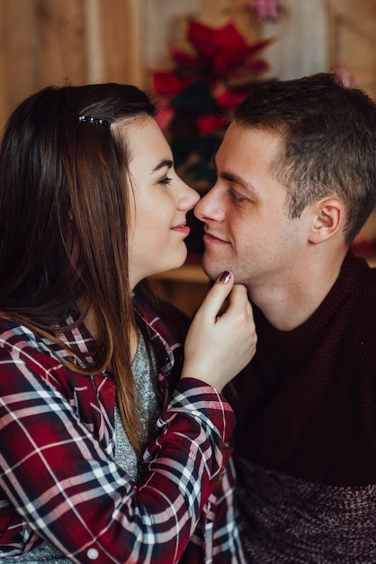 Man and woman together in a warm atmosphere at home