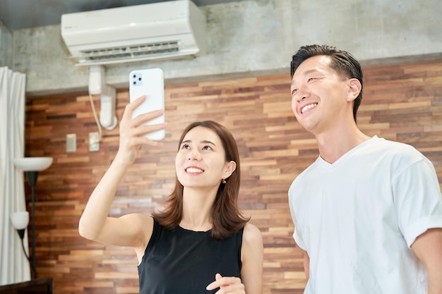 Man and woman using smartphone