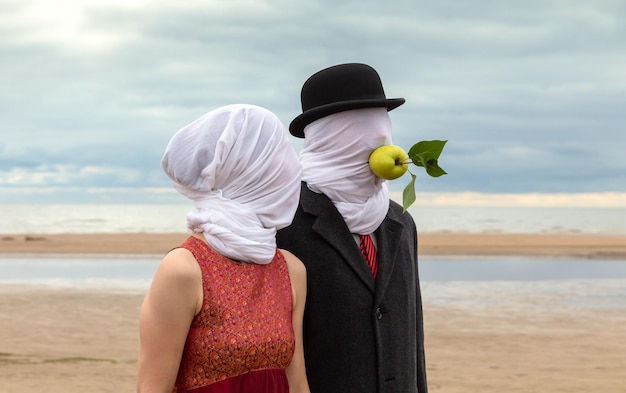 Man and woman with white fabrics on their heads