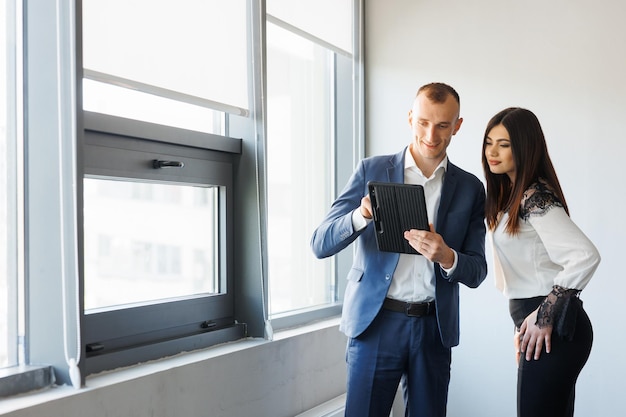 Man and woman working at a start up together Digital start up business concept