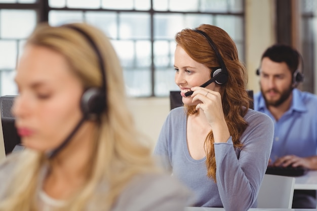 Man and women working in office