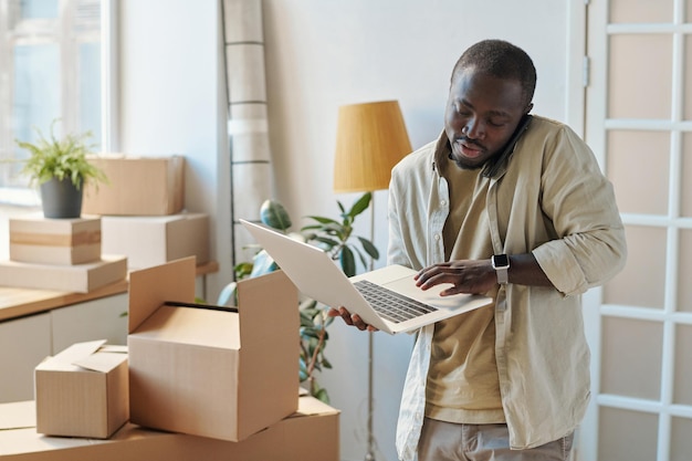 Man working online on laptop at home