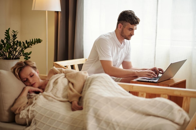 Man working online on laptop