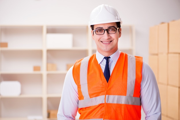 Man working in postal parcel delivery service office