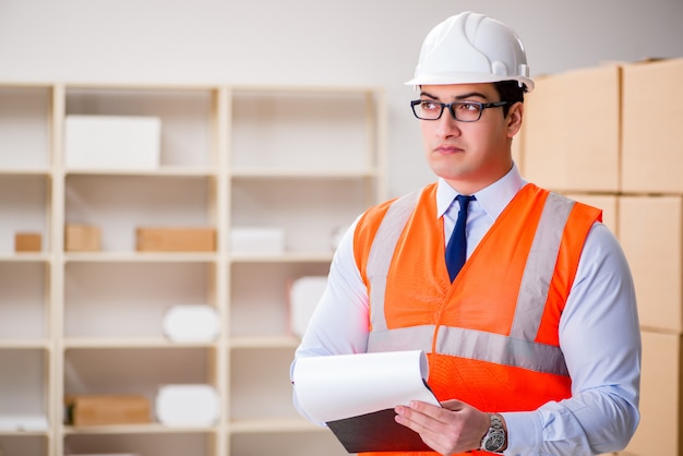 Man working in postal parcel delivery service office