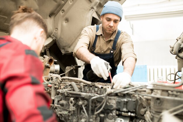 Man Working In Service Garage