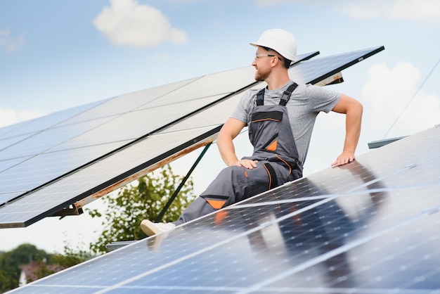 A man working at solar power station