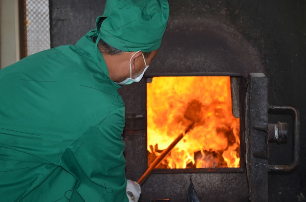 man working with Incinerator