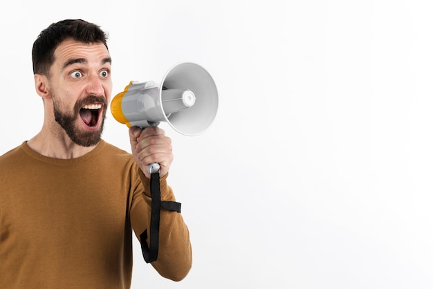 Man yelling through megaphone