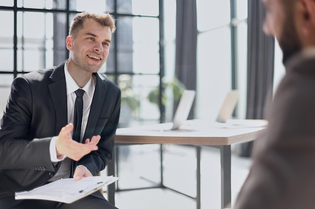 Manager interviewing a candidate in office