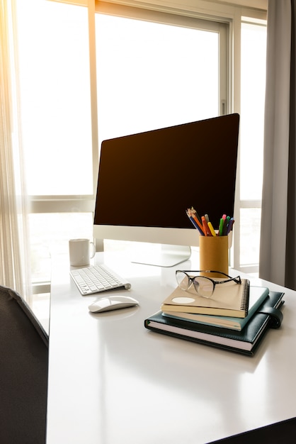 Manager Table with Desktop Computer and Business Notes