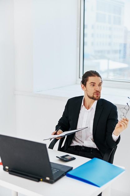 Manager work in the office in front of a laptop executive