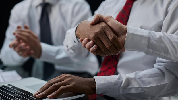 Managers and job seekers shake hands after a job interview