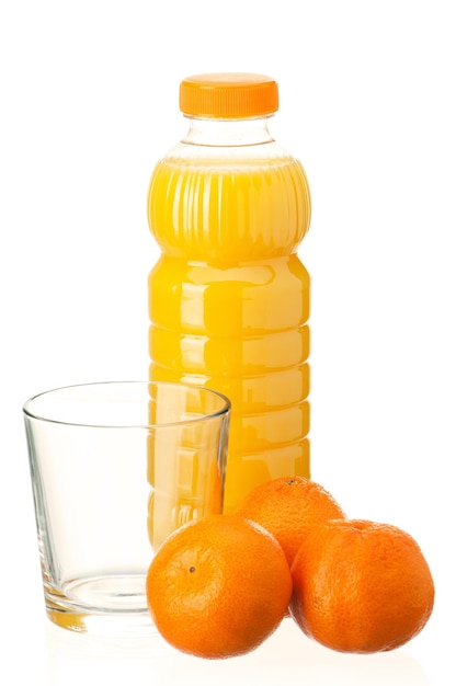 Mandarin juice in plastic bottle and mandarin fruits on white background