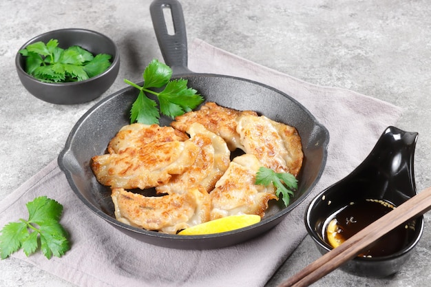 Mandu is Korean Dumpling served with Korean sweet and spicy sauce.