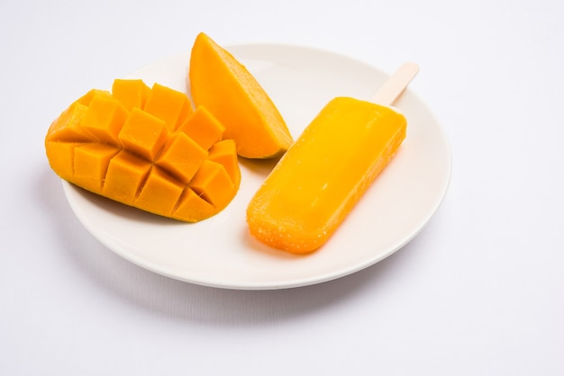 Mango flavoured ice candy or ice bar or kulfi, made up of sweet and tasty alphonso or hapoos Aam