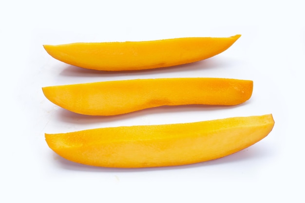 Mango fruit slices on white background