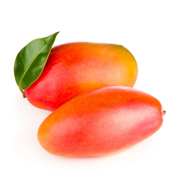 Mango fruit with green leave isolated on white background.