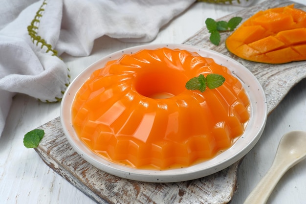 Mango pudding, jelly, dessert on white background