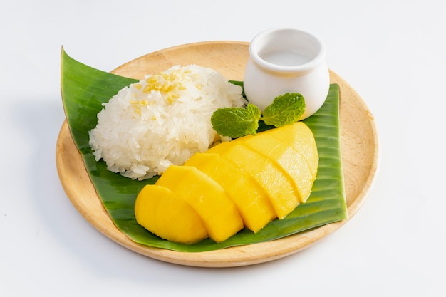 Mango with sticky rice is popular traditional dessert of thailand