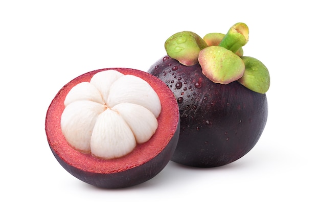 Mangosteen with cut in half and water droplets isolated on white background. Clipping path.