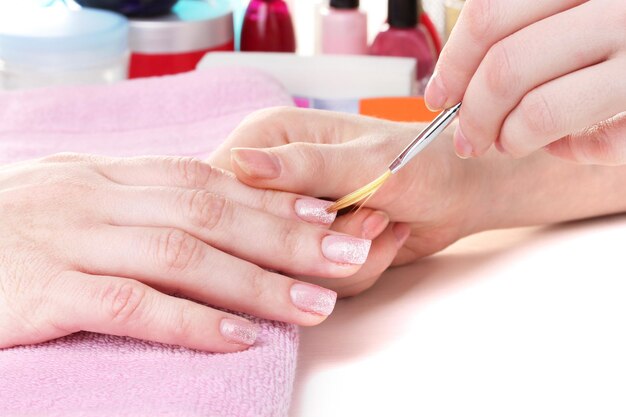 Manicure process in beautiful salon