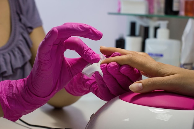 Manicure process in salon